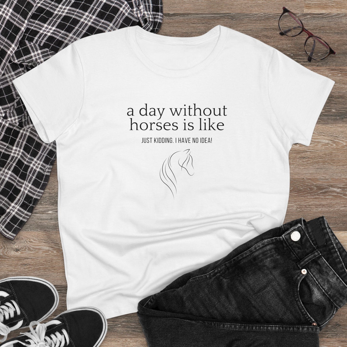 Flat lay of the horse t-shirt with jeans